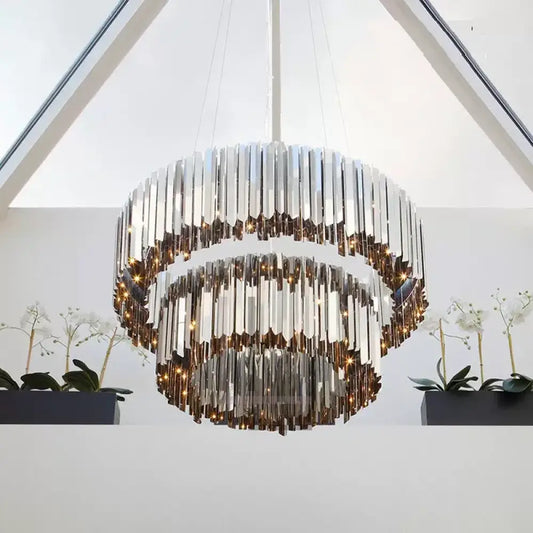 Modern Nordic luxury chandelier Celestial in premium stainless steel with golden, silver, or black finishes. The design, inspired by Northern skies, combines contemporary elegance with integrated LED lighting, creating a warm, inviting ambiance for living rooms or bedrooms.